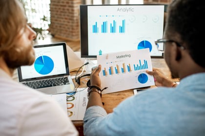 coworkers-working-together-with-analytics-2025-03-13-03-04-34-utc